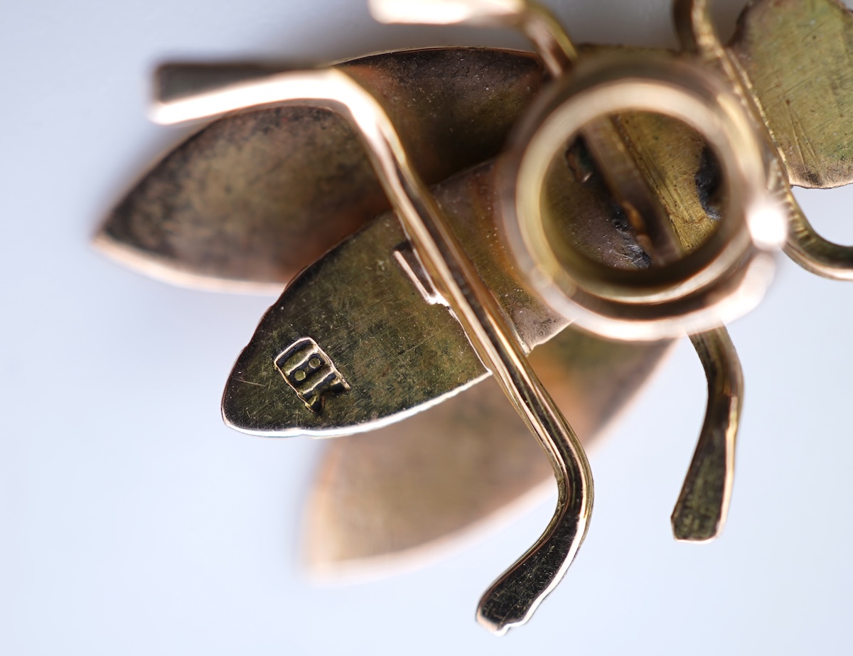A set of four Retro gold and enamel buttons, mid 20th century